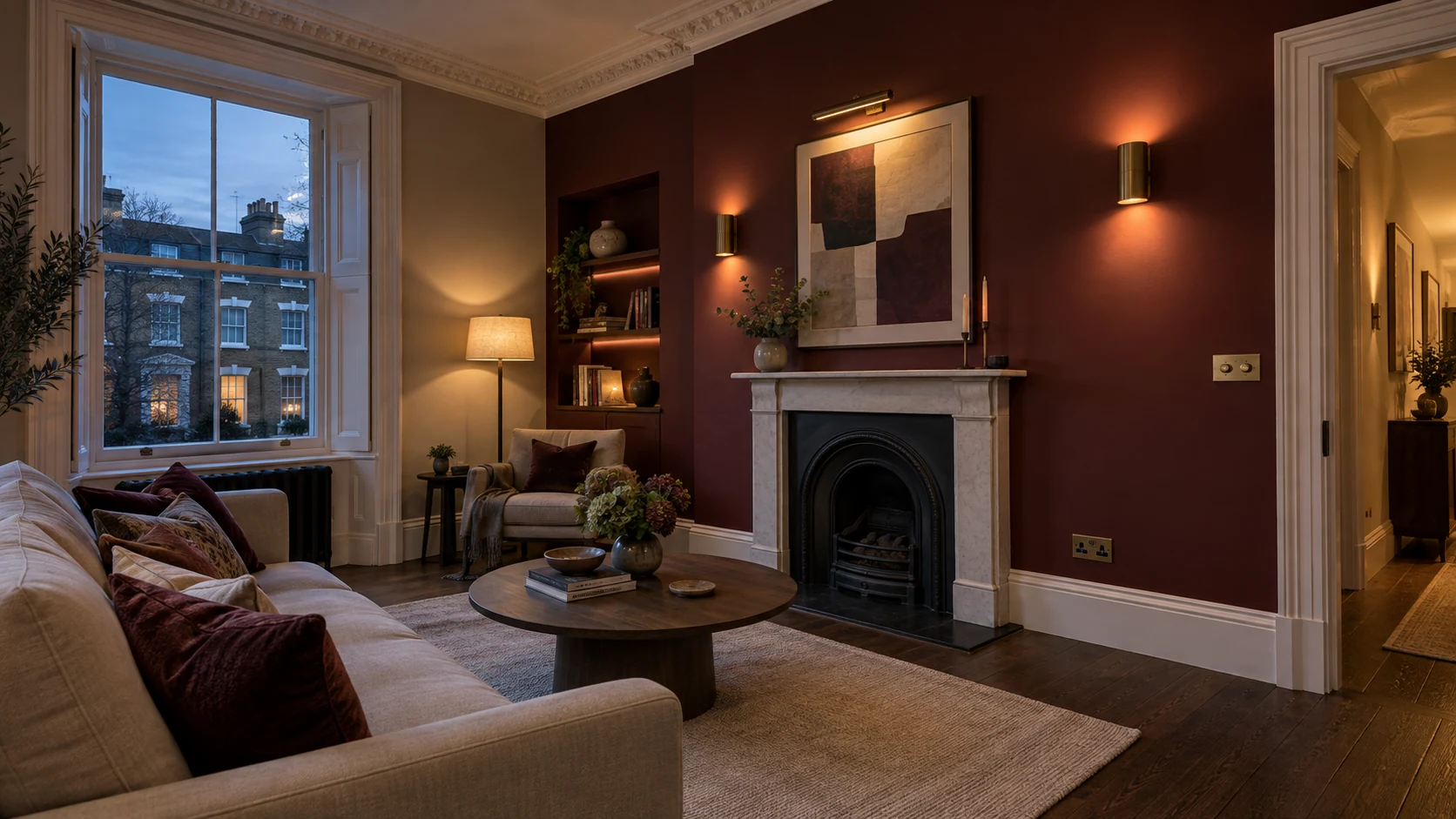 Refurbished period living room with layered lighting, wall controls and discreet electrical sockets