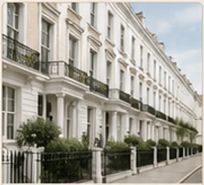 Row of elegant white stucco townhouses on a residential garden square.