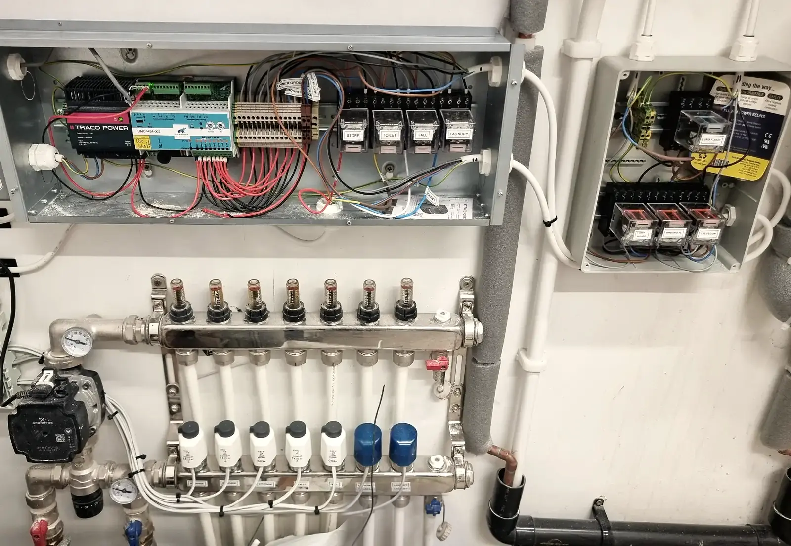 Polar Bear interface and relay controls coordinating heating and air conditioning in a Notting Hill residence.