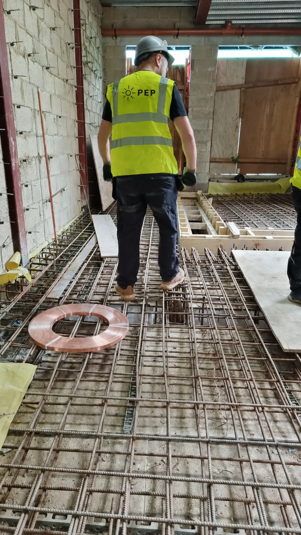 Copper tape, electrodes and structural steel forming a continuous earth network at the Streatham development.